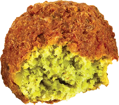 A crispy falafel bitten open to show its green, herby inside